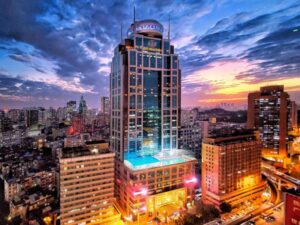 Skyline of Guangzhou city at dusk with modern skyscrapers near Hotel Asia International